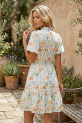 Mini-robe froncée à imprimé floral beige à manches bouffantes et taille haute