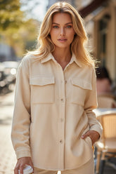 Chaqueta de manga larga en albaricoque abotonado de terciopelo de color liso