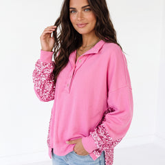 Henley sweatshirt with high and low hem in patchwork of candy sequins