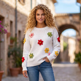 Pull blanc en maille texturée à fleurs colorées en applique