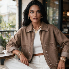 Veste en jean zippée à poches ornées de rivets