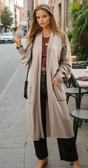 Long beige knitted cardigan with side pockets *