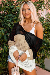 Haut en tricot noir à manches longues avec œillets et bloc de couleur dans le dos torsadé