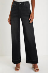 Jean ample noir à ourlet brut et poignets uniques, droit, taille haute