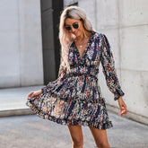 Robe fleurie bleue à volants et dos ouvert