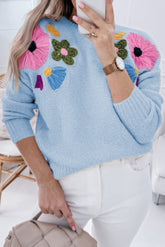 Suéter de punto azul claro con bordes acanalados con patrón de flores