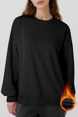 Black solid sweatshirt with dropped shoulders and fleece lining