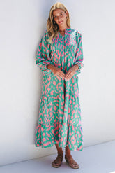 Green abstract print maxi dress with puff sleeves and knotted notched collar