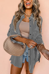 Chemise longue noire avec poches et manches retroussées *-A WOMAN WE LOVE