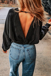 Black Sweatshot in the shape of a with open back and faded with acid