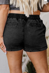 Short en jean noir à taille élastique et poches