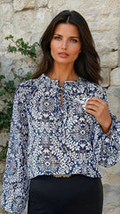 Tribal lace -up and ruffle print blouse *