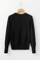 Pull noir léger à col rond et coupe ajustée