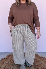 Pantalon ample grande taille à rayures noires et taille à nouer