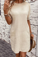 Beige right mini-drock with puffy sleeves and crumpled lace border