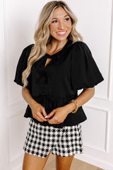 Chemise péplum noire à manches bouffantes *-A WOMAN WE LOVE