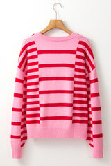 Pull ample rose à rayures et manches bouffantes