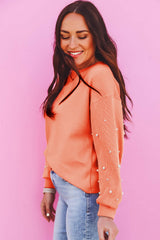 Sudadera con mangas de perlas y hombros caídos, cuello redondo