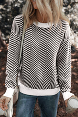 Black sweater with contrasting edges and round neck, falling shoulders