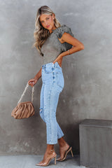 Haut en tricot côtelé gris à manches volantées en maille à pois