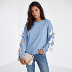 Sweat-shirt bleu à col rond et manches tombées