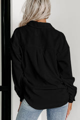 Short black jacket in ribbed velvet pied-de-poule *