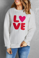 White sweatshirt in twisted knitting embroidered love caterpillar