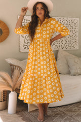 Long dress with collar and sleeve buttons bracelet and yellow flowers print
