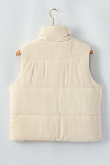 Gilet matelassé beige en velours côtelé à col montant, zippé