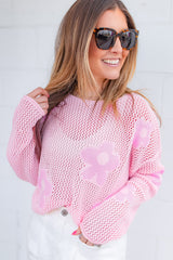 Light pink drop shoulder sweater in openwork knit with large flowers