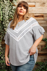 Light gray high with short sleeves and embossed ruffles with lace insert, large size