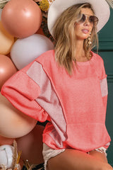 Kangaroo pocket sweatshirt and contrasting patchwork