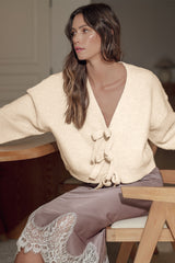 Jet stream cardigan ample knitted with butterfly knot on the front and v -neck