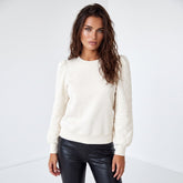 United white sweatshirt with puffy sleeves and round neck