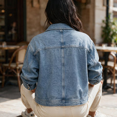 Veste en jean zippée à poches ornées de rivets