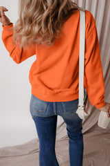 Dropped shoulder terry sweatshirt with solid fleece lining in russet orange