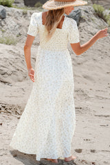 Long white dress with ruffles *