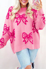 Pink full pink sweater with drooping shoulders and knot pattern