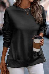 Sudadera negra con espinillas de prensa y hendiduras laterales