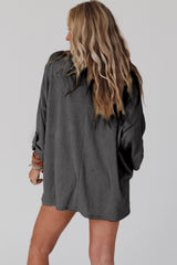 Dark grey ribbed oversized top with rolled up sleeves and chest pocket