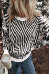 Black sweater with contrasting edges and round neck, falling shoulders