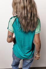T-shirt green with V-neck and apparent seams