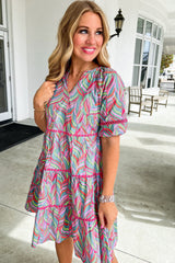 Light blue dress with puffy sleeves and abstract printed ricrac ruffles