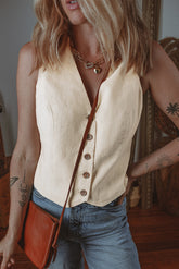White vest buttoned with v * collar