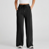 Pantalon de survêtement large noir à taille haute et cordon