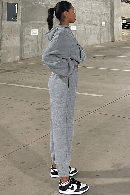 Ensemble de vêtements de sport gris uni avec sweat à capuche et pantalon de jogging à épaules tombantes