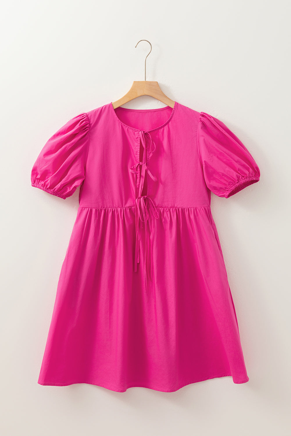 Mini-robe rose vif à manches bouffantes *