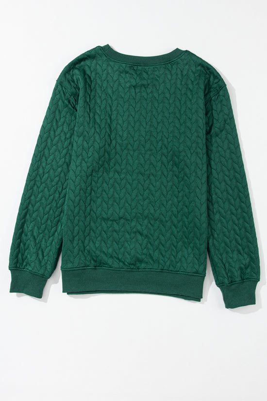 Bright and cheerful cable knit sweatshirt in blackish green