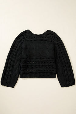 Short black sweater in Twisted Twisted mesh