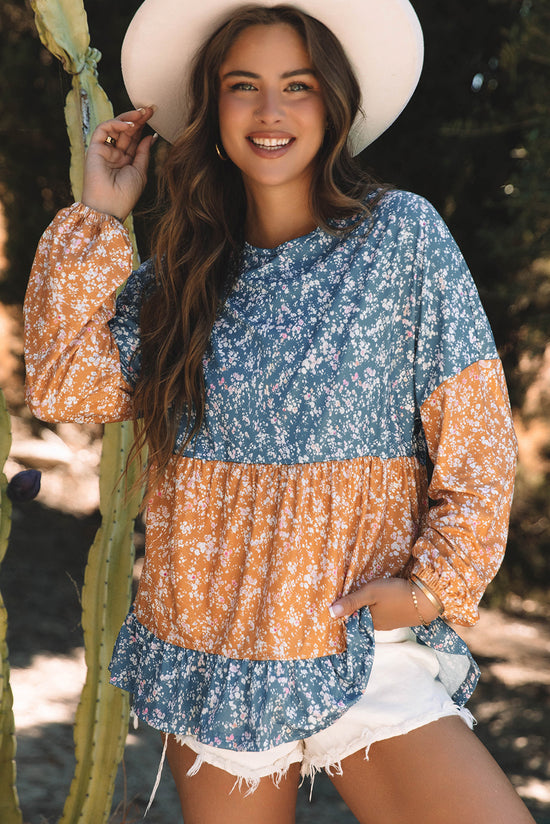 Blusa naranja con flores y bloques de color *